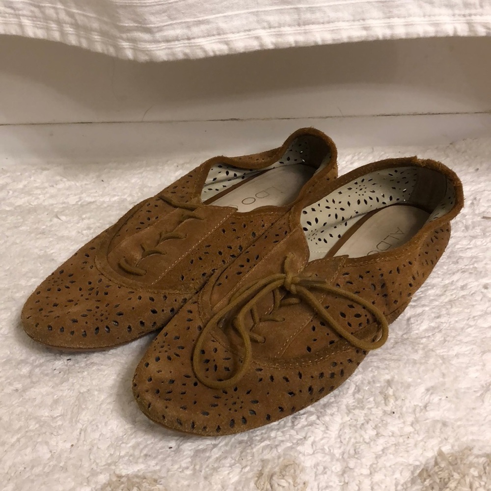 Tan oxford-style shoes